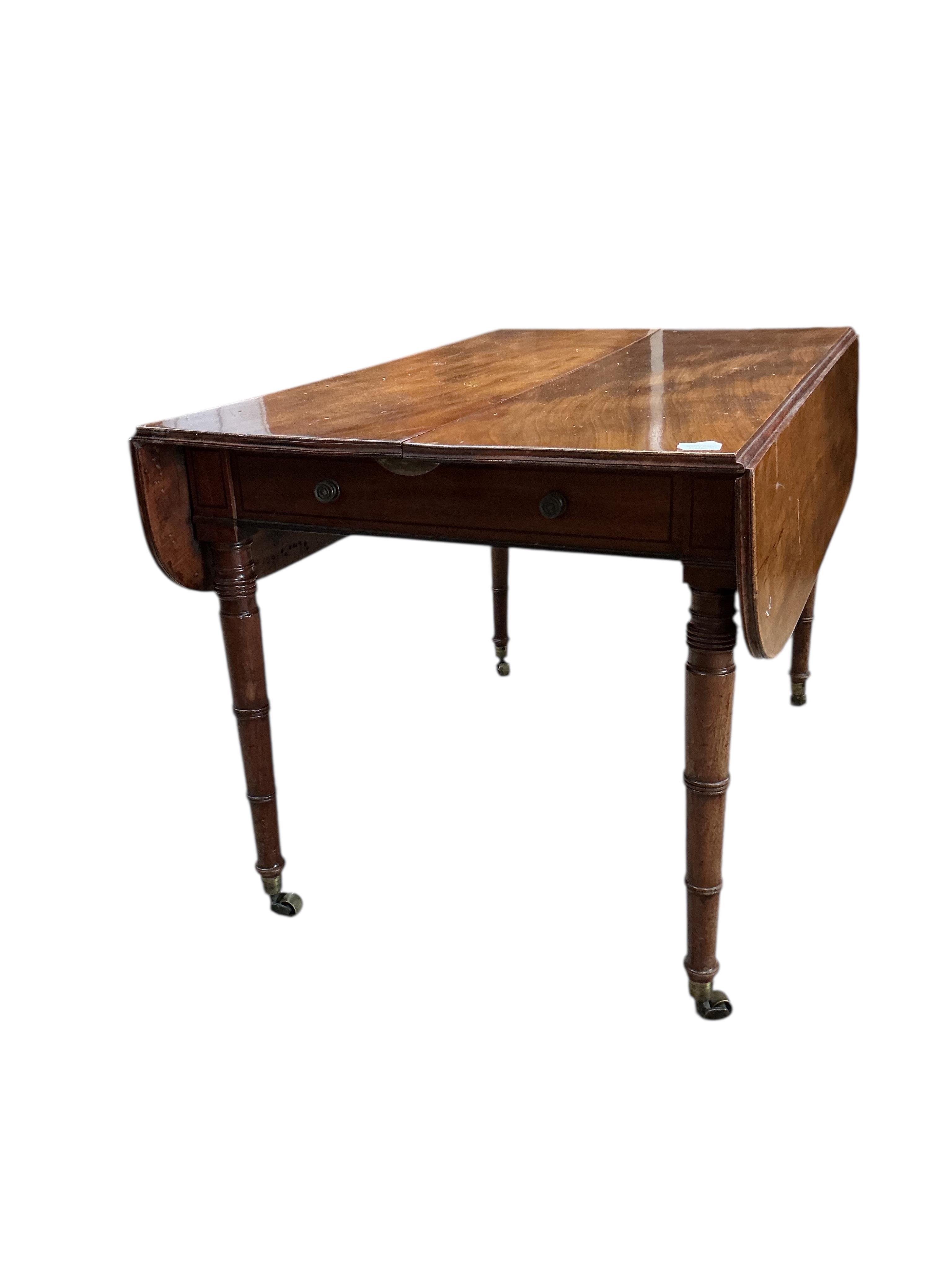 A Regency mahogany Pembroke extending dining table, width 258cm extended, depth 114cm, height 73cm